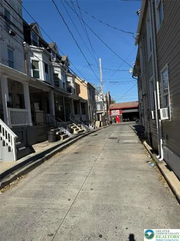 a view of the street with sitting area