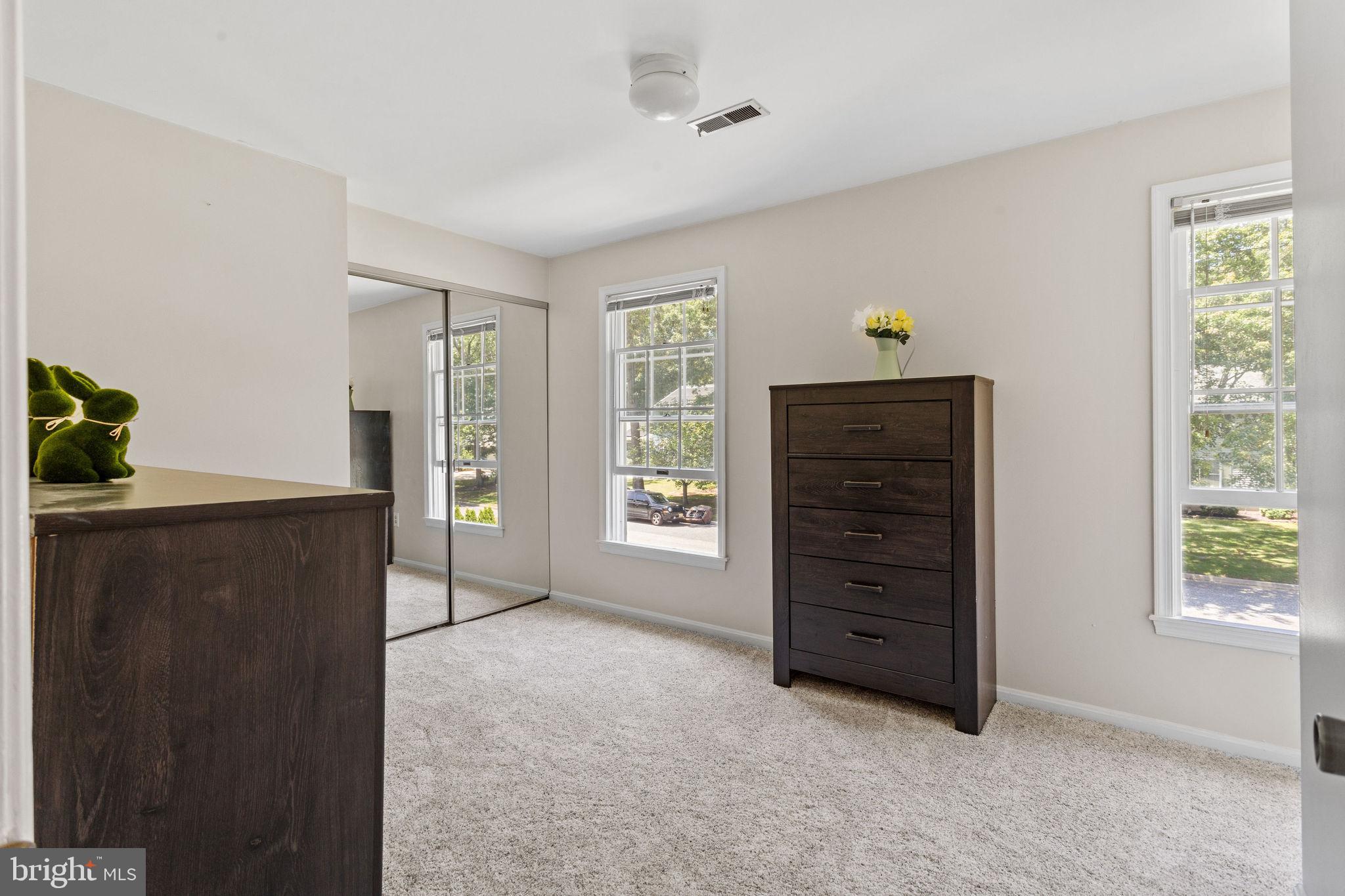 721 Webster Drive Monroeville, NJ 08343 - Photo 18 of 38 a view of an empty room with a window and dresser