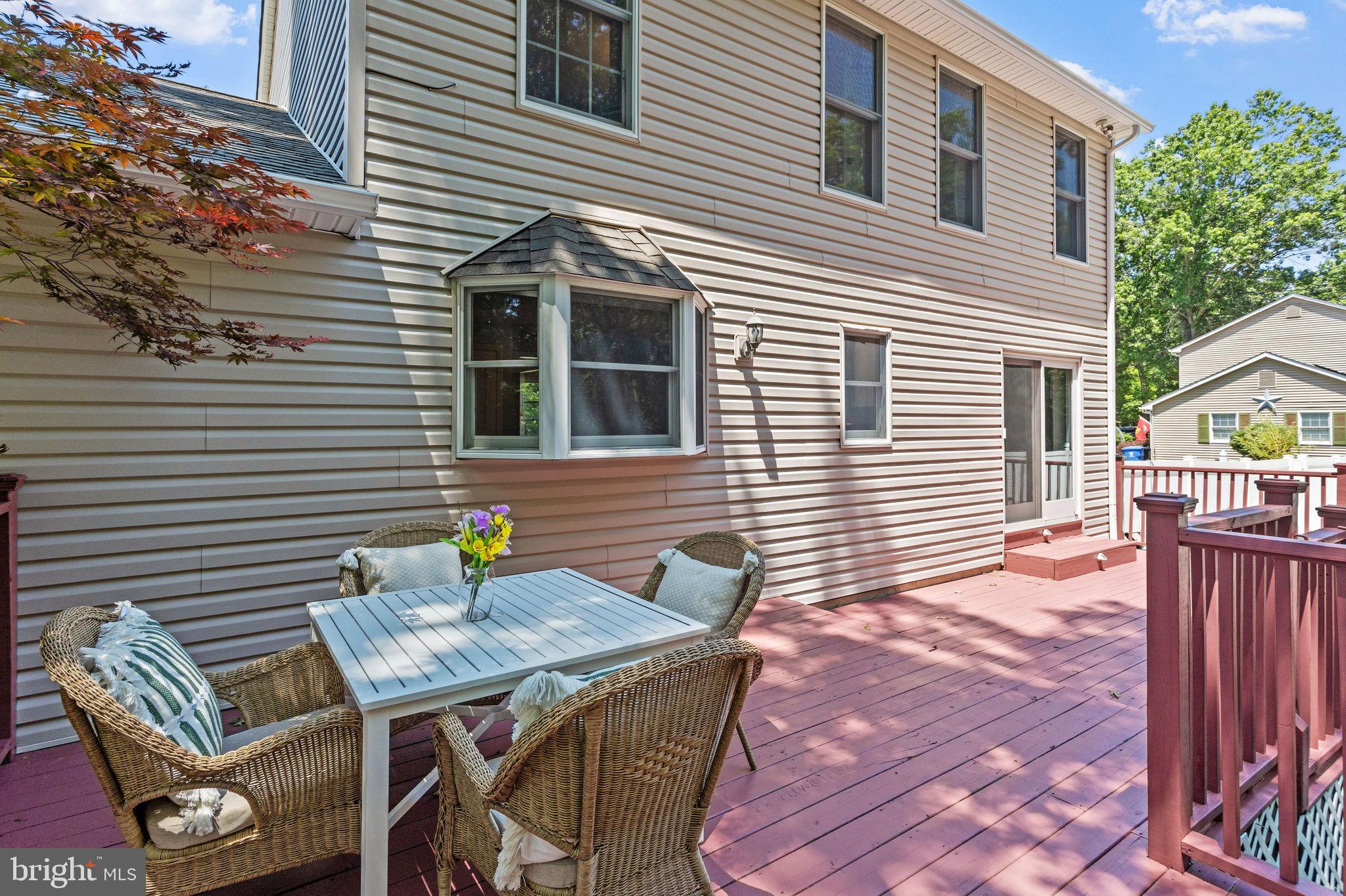 721 Webster Drive Monroeville, NJ 08343 - Photo 27 of 38 a view of a patio with a table and chairs