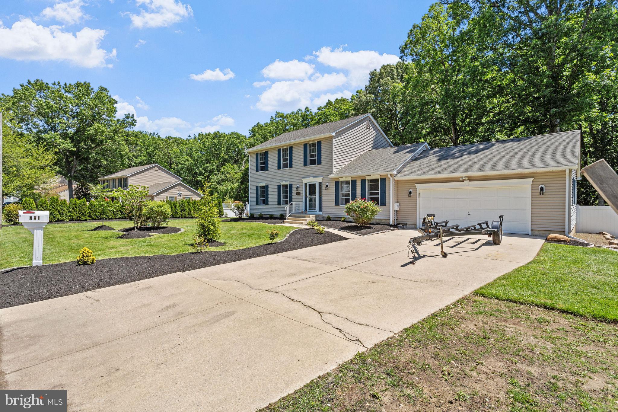 721 Webster Drive Monroeville, NJ 08343 - Photo 30 of 38 a house view with a garden space