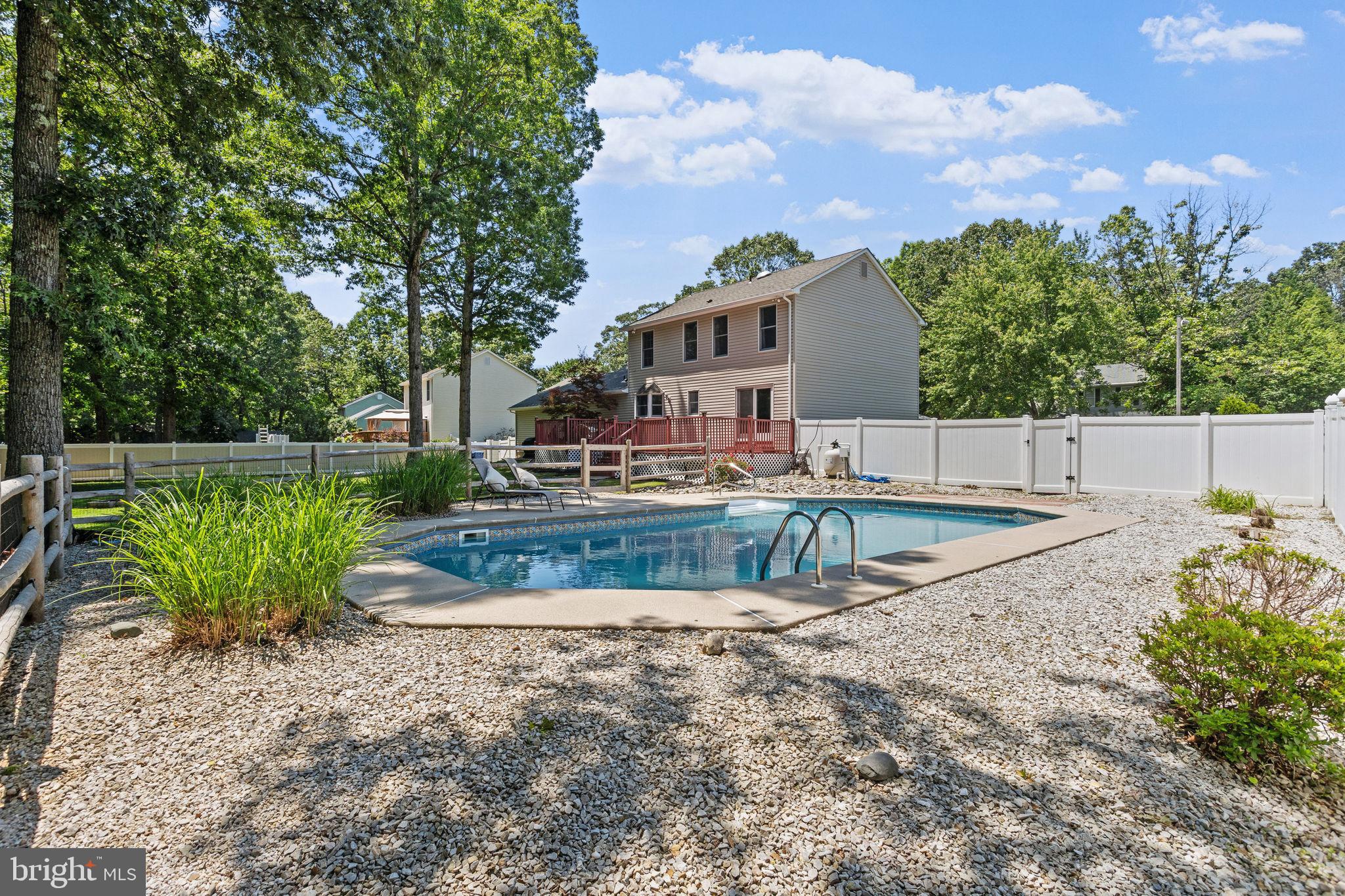 721 Webster Drive Monroeville, NJ 08343 - Photo 3 of 38 a view of a house with a yard and a large tree