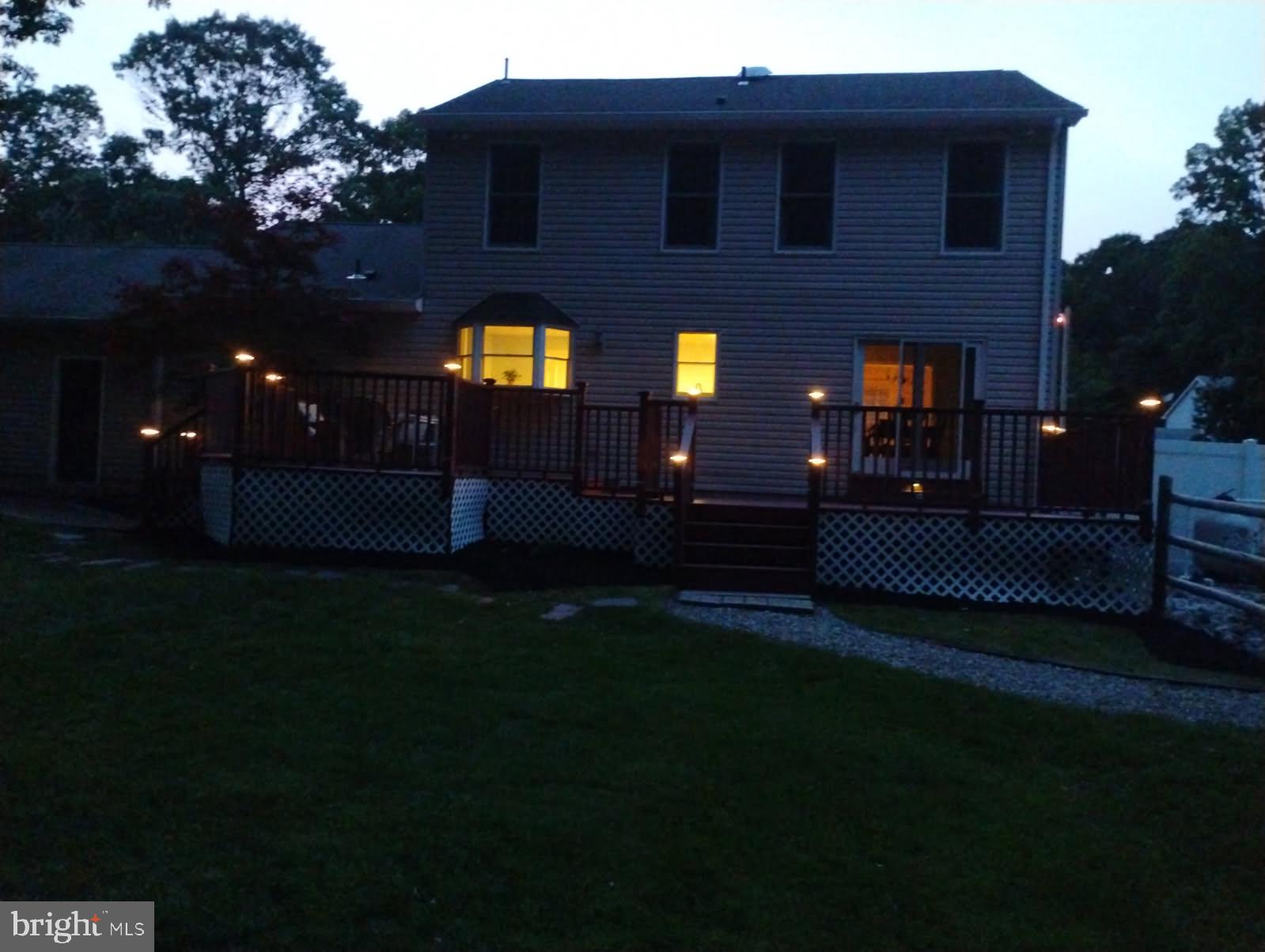 721 Webster Drive Monroeville, NJ 08343 - Photo 34 of 38 a front view of a house with a garden