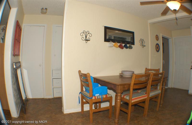 4101 South Monroe Street Amarillo, TX 79110 - Photo 6 of 6 a view of a livingroom with furniture and a flat screen tv