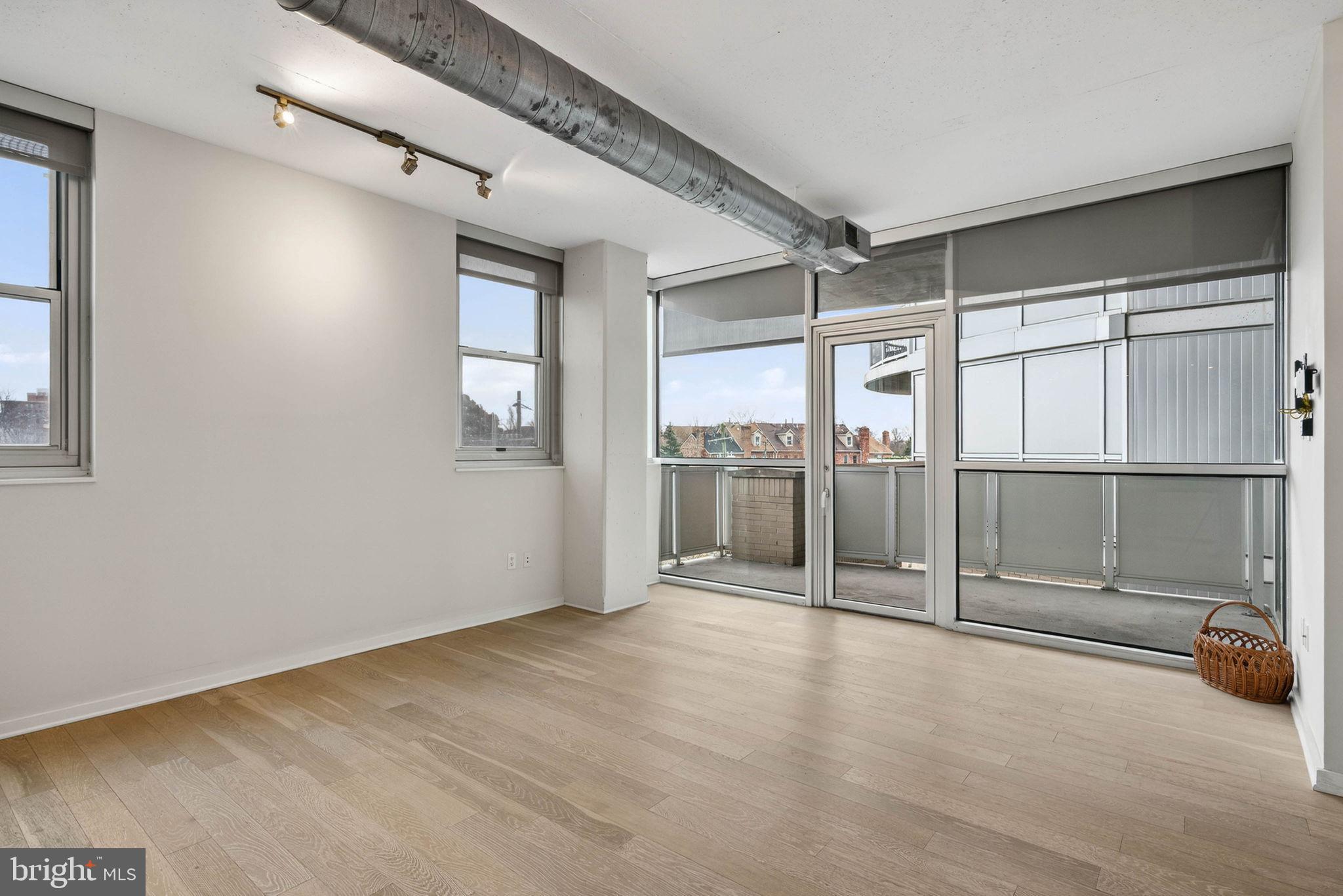 3409 Wilson Boulevard, Unit 301 Arlington, VA 22201 - Photo 11 of 39 an empty room with entrance door