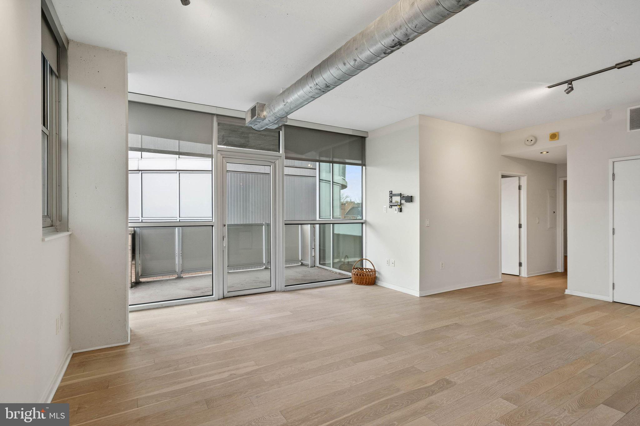 3409 Wilson Boulevard, Unit 301 Arlington, VA 22201 - Photo 12 of 39 Spacious urban living with natural light.