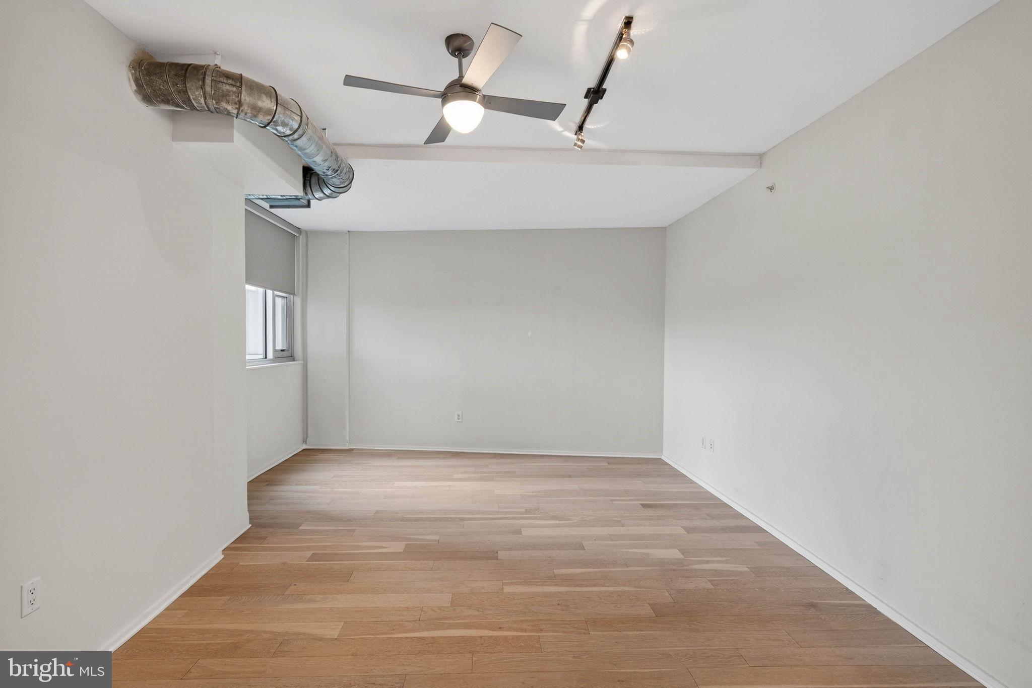 3409 Wilson Boulevard, Unit 301 Arlington, VA 22201 - Photo 23 of 39 a view of an empty room