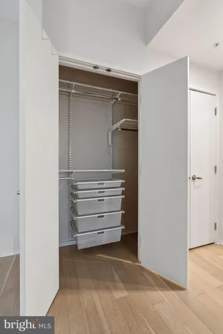 a kitchen with stainless steel appliances granite countertop a sink refrigerator and microwave