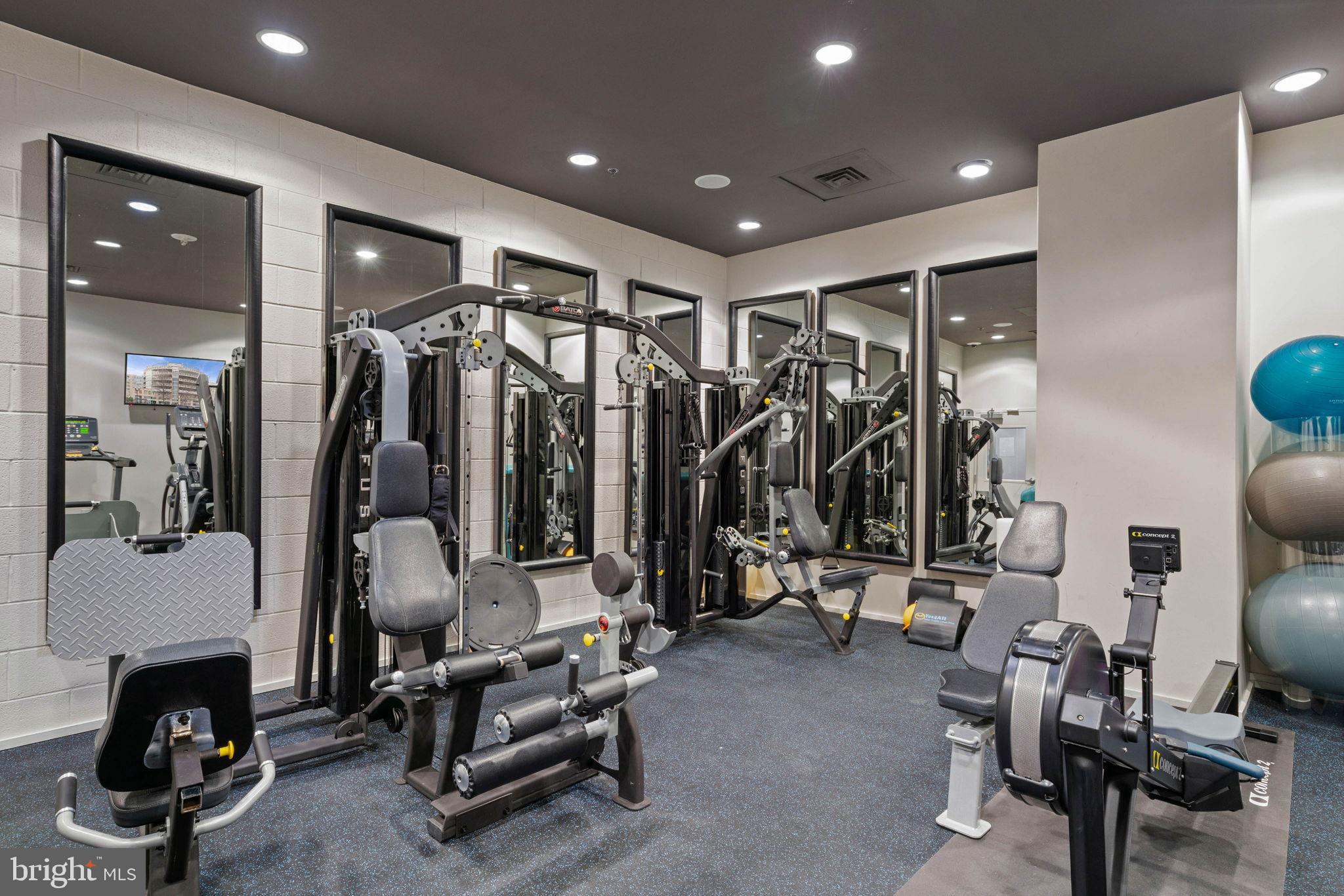3409 Wilson Boulevard, Unit 301 Arlington, VA 22201 - Photo 28 of 39 a view of a room with gym equipment