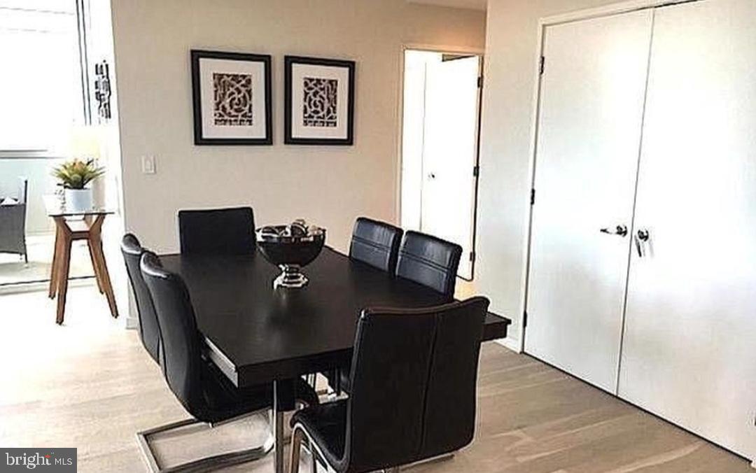 3409 Wilson Boulevard, Unit 301 Arlington, VA 22201 - Photo 35 of 39 Modern dining space with sleek design.