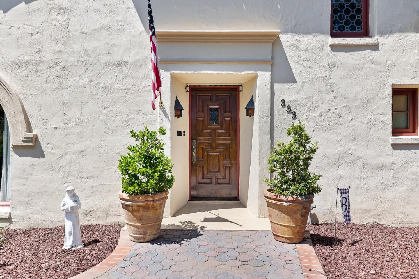 333 Crest Drive San Jose, CA 95127 - Photo 12 of 69 a potted plant sitting in front of a building