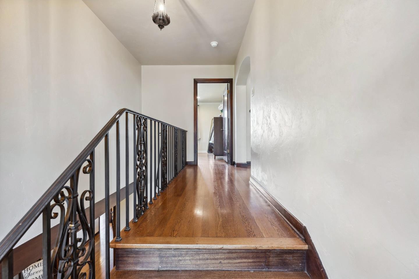 333 Crest Drive San Jose, CA 95127 - Photo 32 of 69 a view of a hallway with wooden floor and staircase