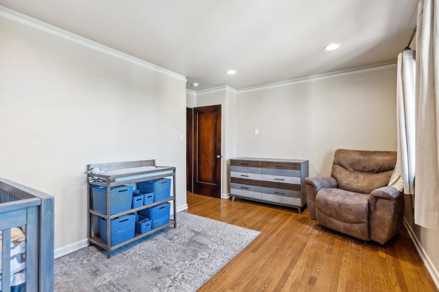 333 Crest Drive San Jose, CA 95127 - Photo 34 of 69 a living room with furniture and a wooden floor