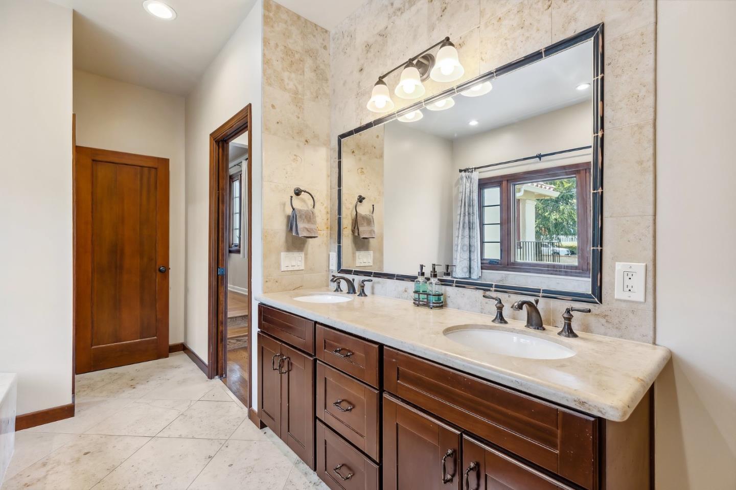 333 Crest Drive San Jose, CA 95127 - Photo 38 of 69 a bathroom with a sink double vanity granite tub shower and a mirror