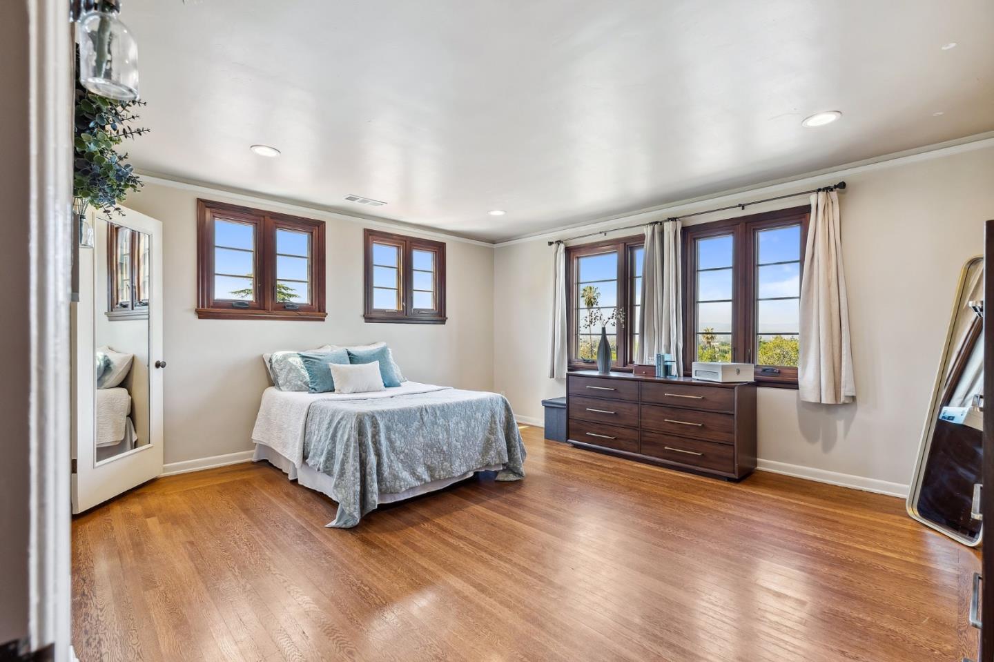 333 Crest Drive San Jose, CA 95127 - Photo 40 of 69 a spacious bedroom with a large bed and a large window