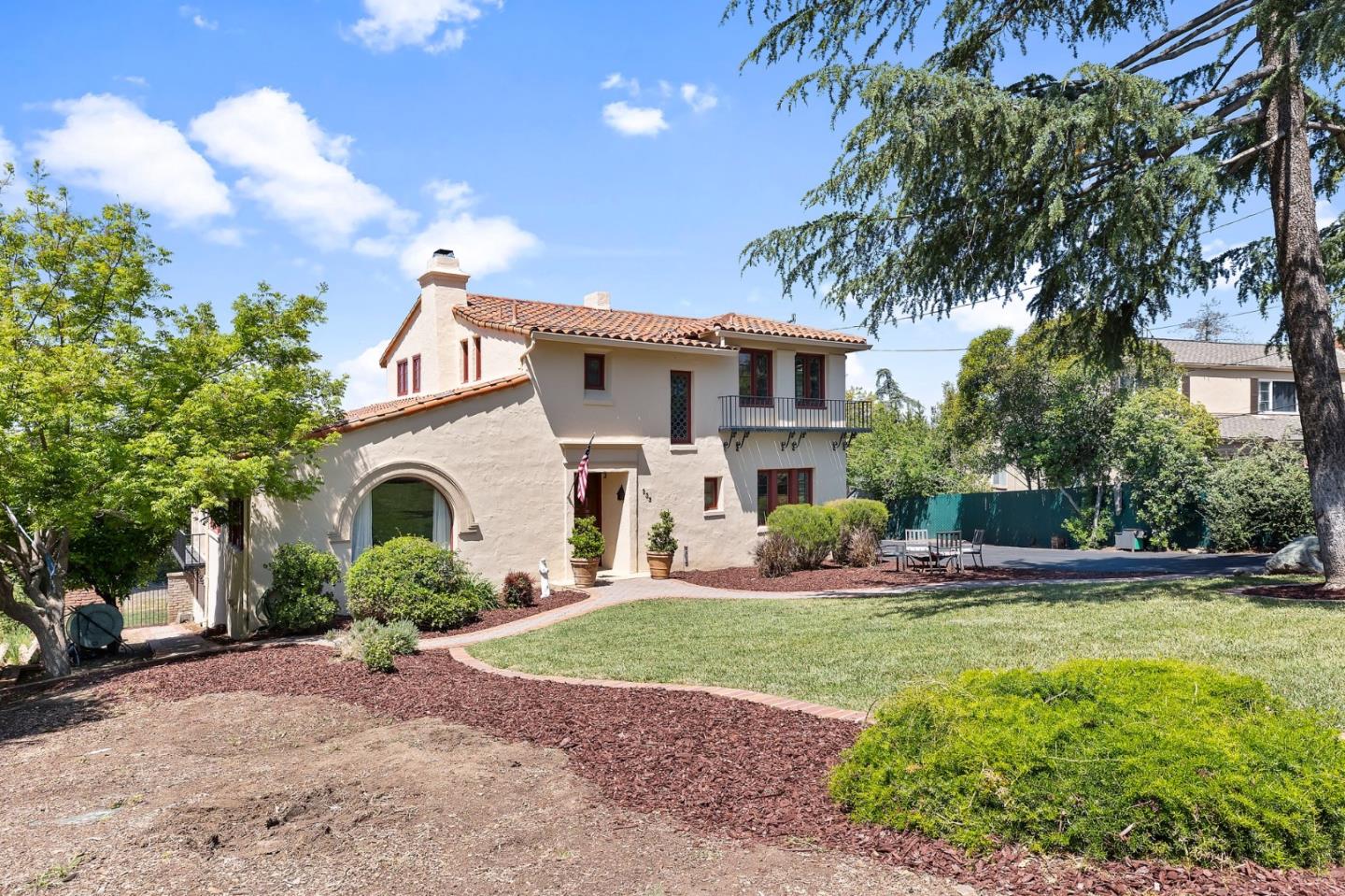 333 Crest Drive San Jose, CA 95127 - Photo 4 of 69 a front view of a house with a yard and garage