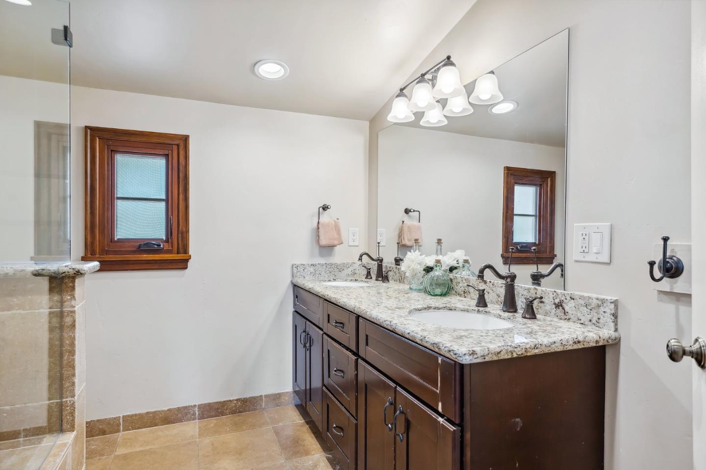 333 Crest Drive San Jose, CA 95127 - Photo 43 of 69 a bathroom with a granite countertop sink and a mirror