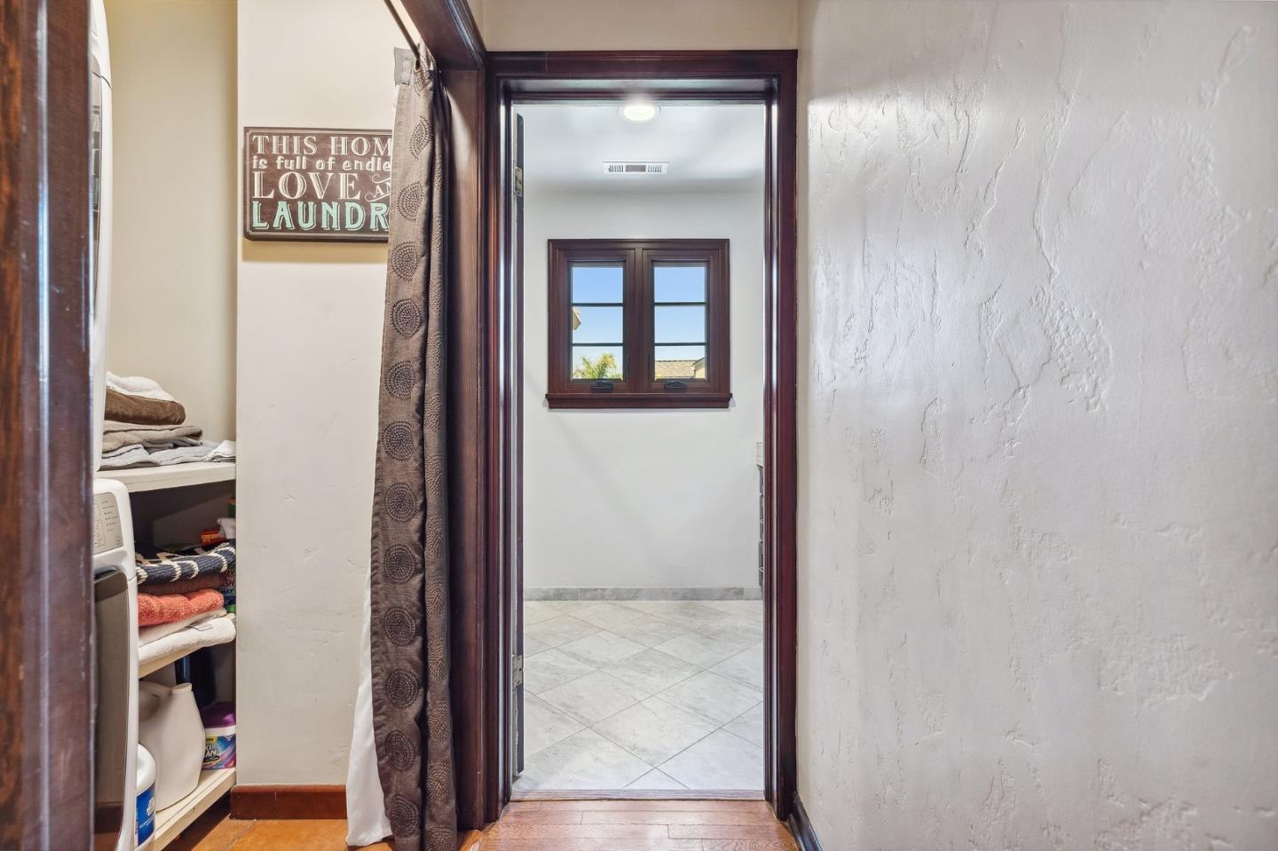 333 Crest Drive San Jose, CA 95127 - Photo 50 of 69 a view of a hallway with wooden floor and a bathroom