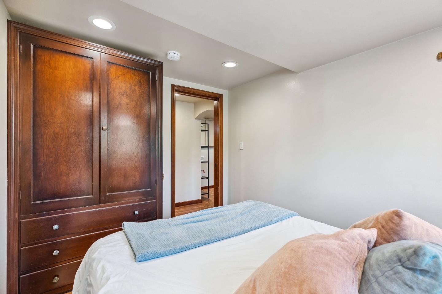 333 Crest Drive San Jose, CA 95127 - Photo 58 of 69 a bedroom with a bed and a large window