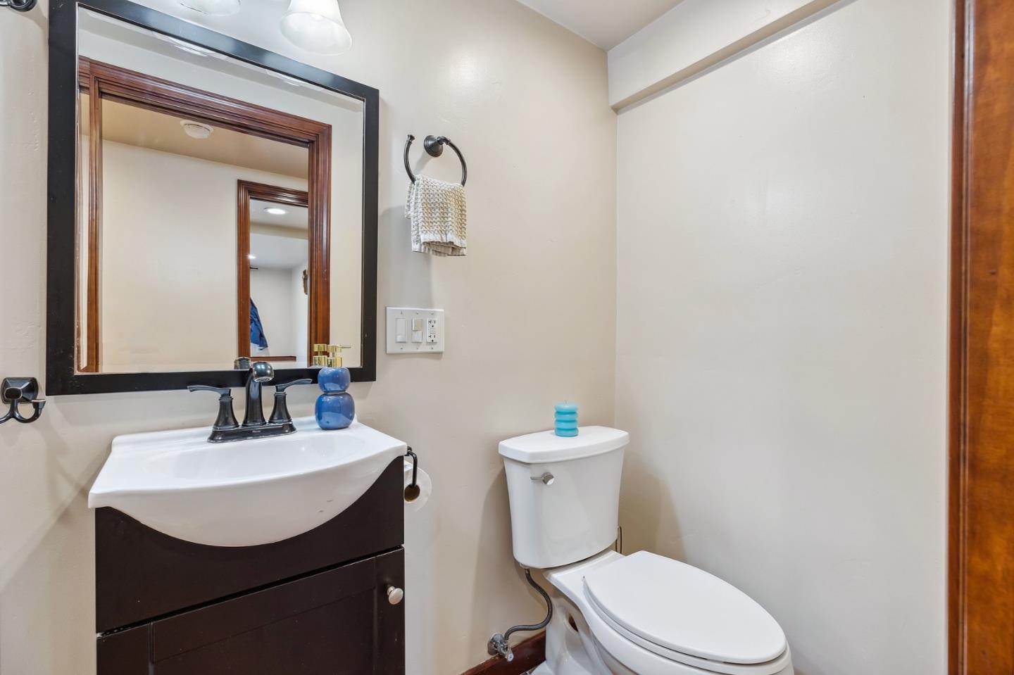 333 Crest Drive San Jose, CA 95127 - Photo 61 of 69 a bathroom with a sink a toilet and mirror
