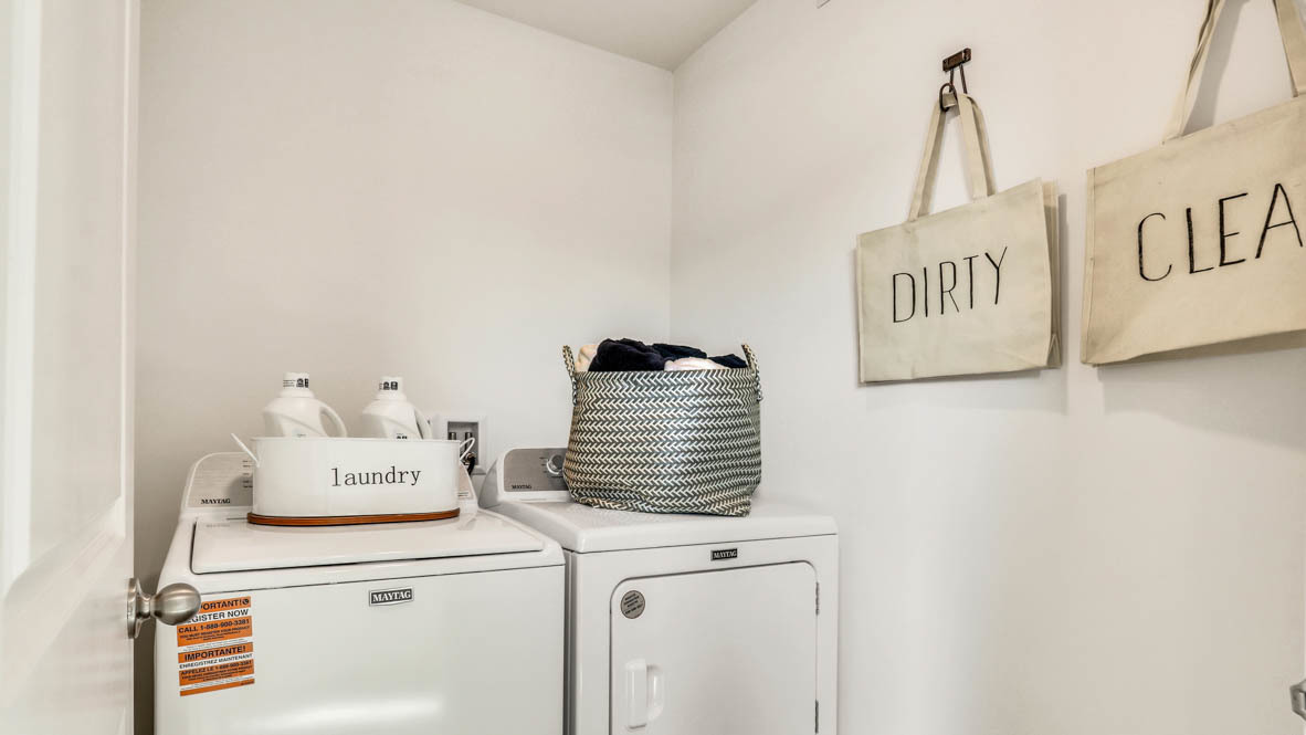7110 Fair Oaks Road Racine, WI 53403 - Photo 20 of 23 a close view of a utility room with washer and dryer
