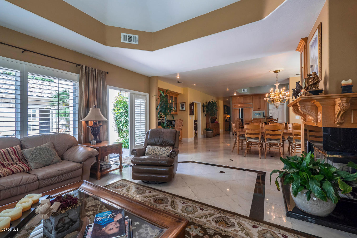 11112 Red Barn Road Camarillo, CA 93012 - Photo 14 of 54 a living room with furniture fireplace and a large window