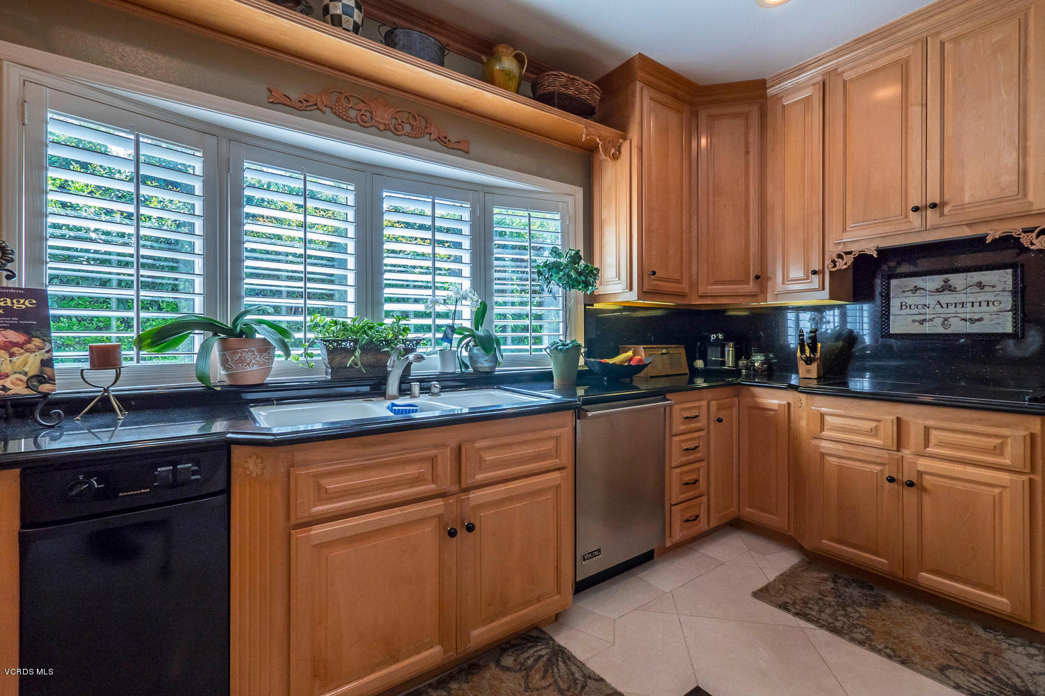 11112 Red Barn Road Camarillo, CA 93012 - Photo 17 of 54 a kitchen with granite countertop a sink and white cabinets