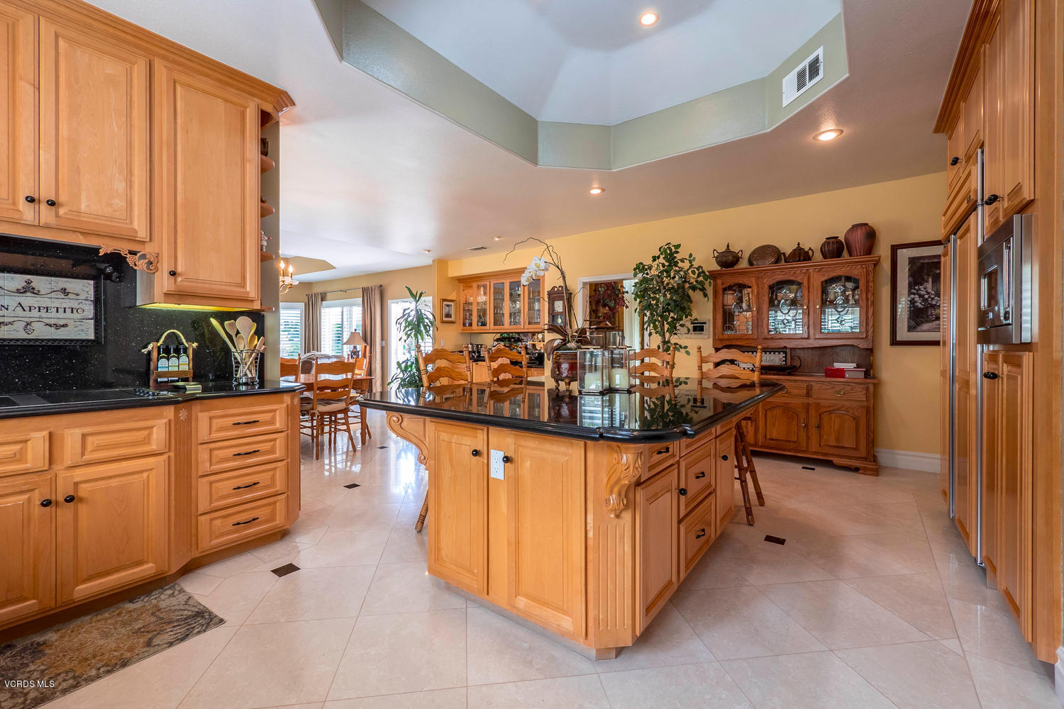 11112 Red Barn Road Camarillo, CA 93012 - Photo 19 of 54 a kitchen with stainless steel appliances granite countertop a stove and cabinets