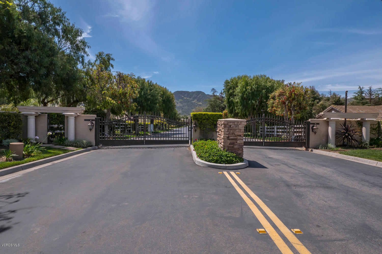 11112 Red Barn Road Camarillo, CA 93012 - Photo 3 of 54 a view of street with wooden fence