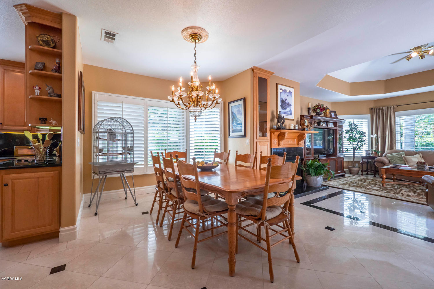 11112 Red Barn Road Camarillo, CA 93012 - Photo 21 of 54 a view of a dining room with furniture wooden floor and chandelier