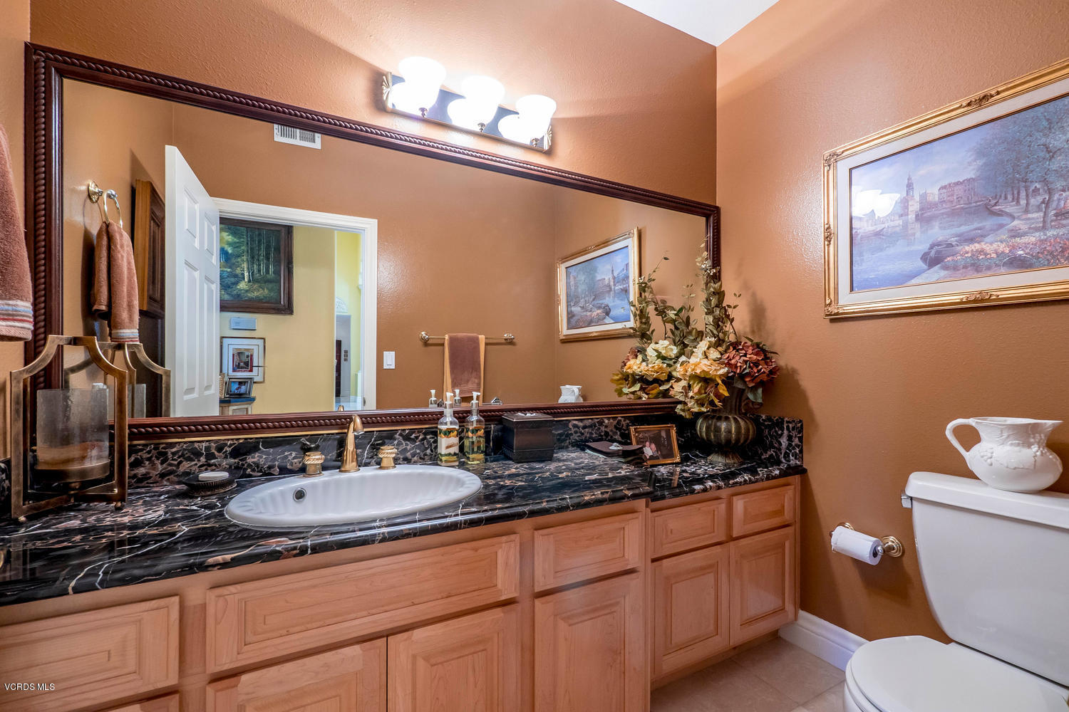 11112 Red Barn Road Camarillo, CA 93012 - Photo 24 of 54 a bathroom with a granite countertop sink and a mirror