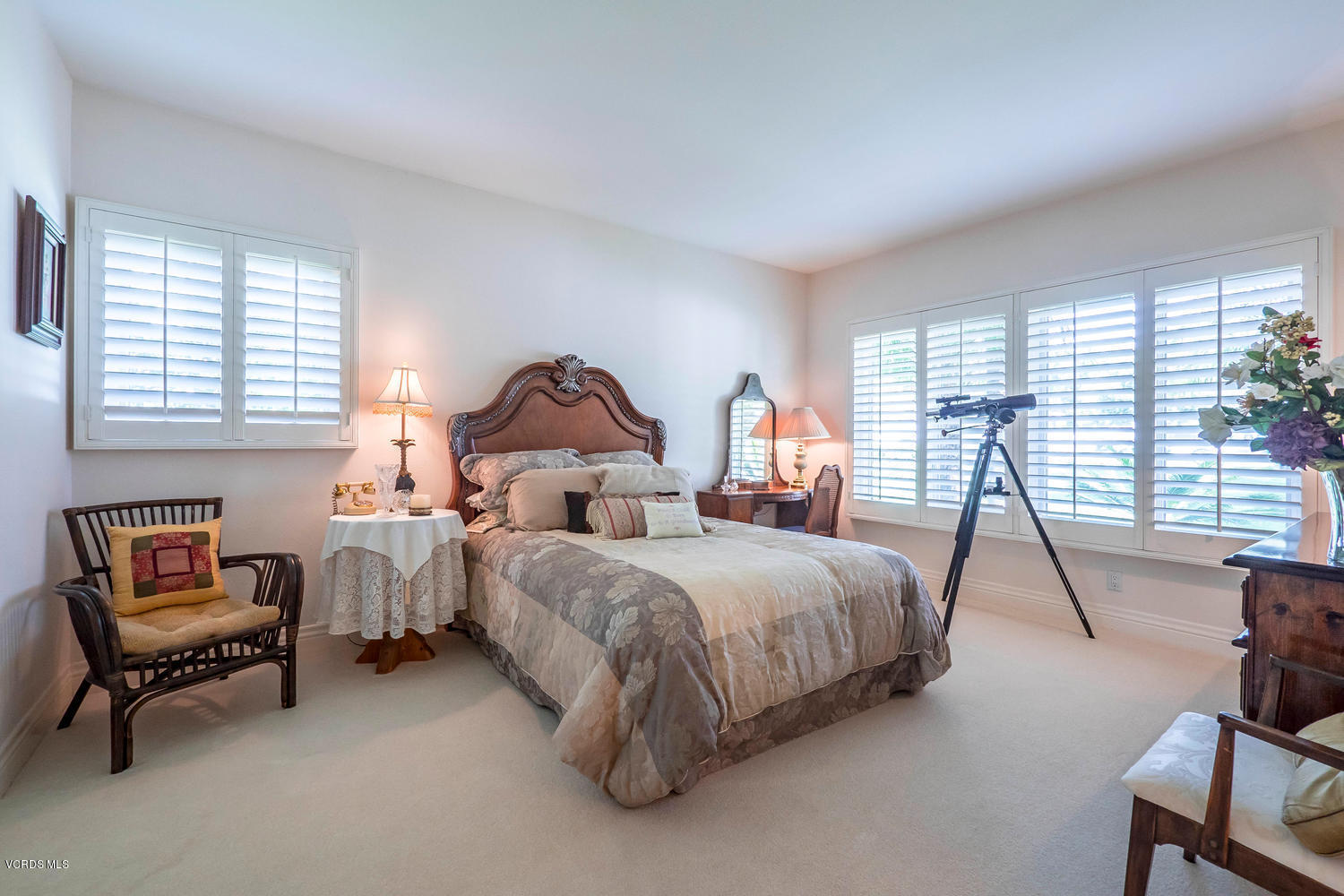 11112 Red Barn Road Camarillo, CA 93012 - Photo 30 of 54 a bedroom with two beds and a window
