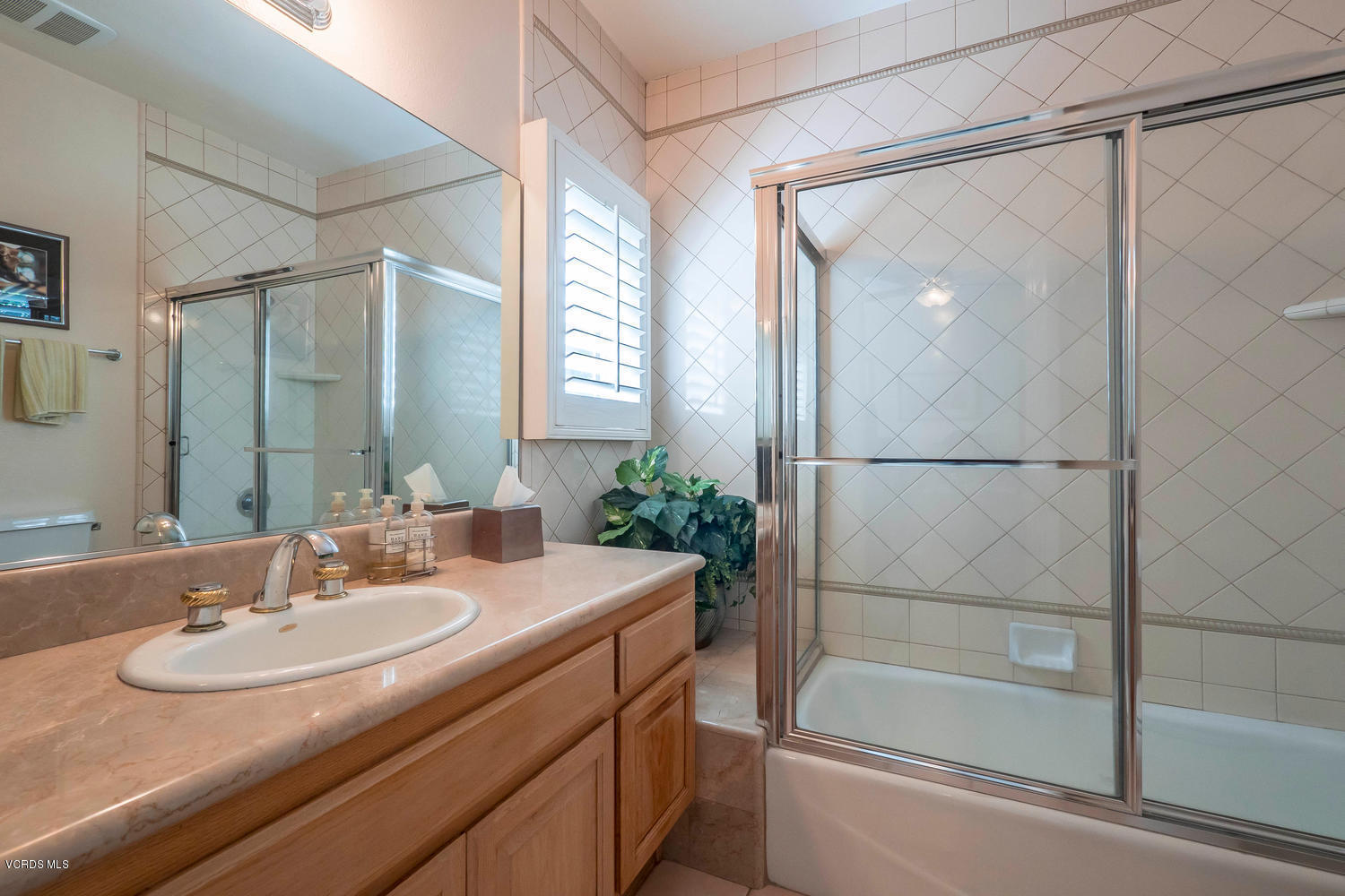 11112 Red Barn Road Camarillo, CA 93012 - Photo 33 of 54 a bathroom with a sink and a mirror