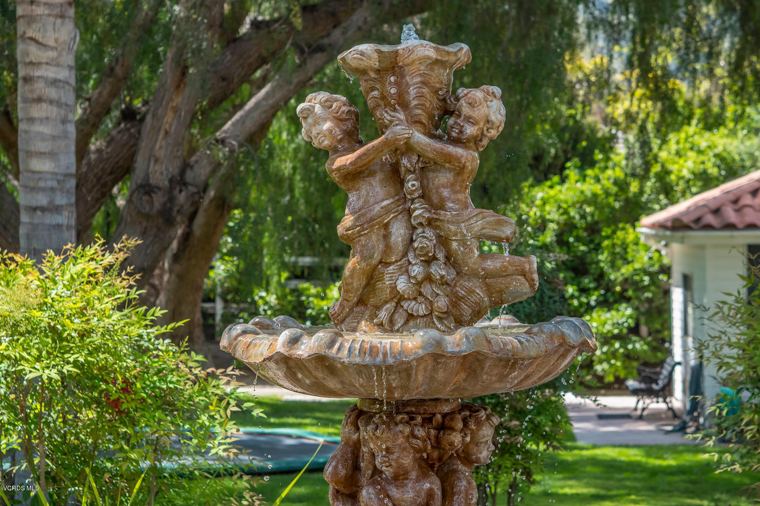 11112 Red Barn Road Camarillo, CA 93012 - Photo 48 of 54 a view of a fountain in the yard with plants