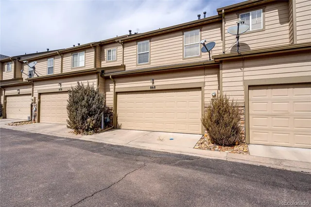 a view of a house with a street