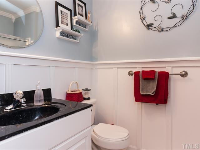 5116 Six Point Trail Raleigh, NC 27616 - Photo 11 of 18 a bathroom with a sink and a mirror