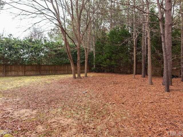 5116 Six Point Trail Raleigh, NC 27616 - Photo 12 of 18 a backyard of a house with lots of green space