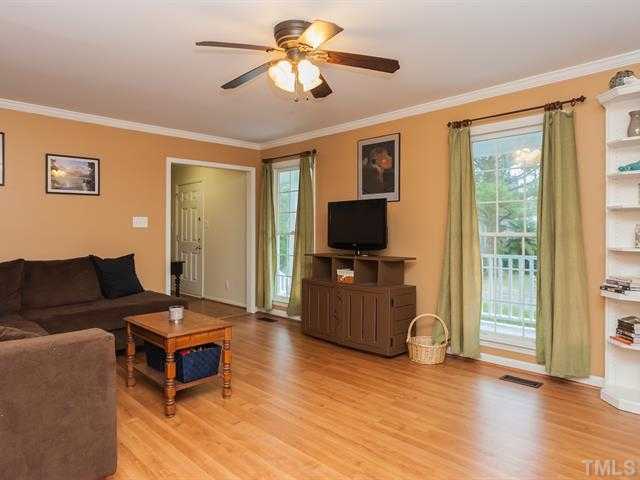 5116 Six Point Trail Raleigh, NC 27616 - Photo 2 of 18 a living room with furniture and a flat screen tv