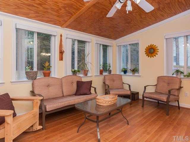 5116 Six Point Trail Raleigh, NC 27616 - Photo 6 of 18 a living room with furniture and a large window