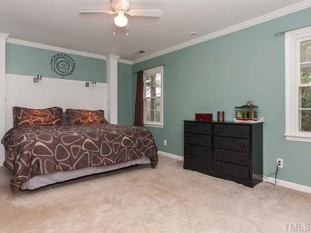 5116 Six Point Trail Raleigh, NC 27616 - Photo 7 of 18 a bedroom with a bed and window