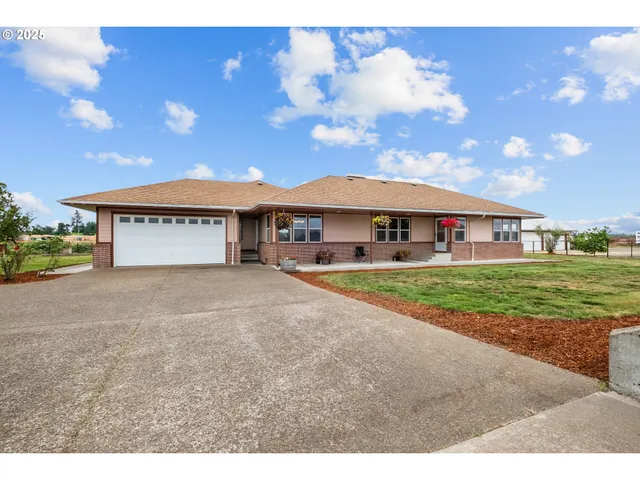 a view of house with outdoor space