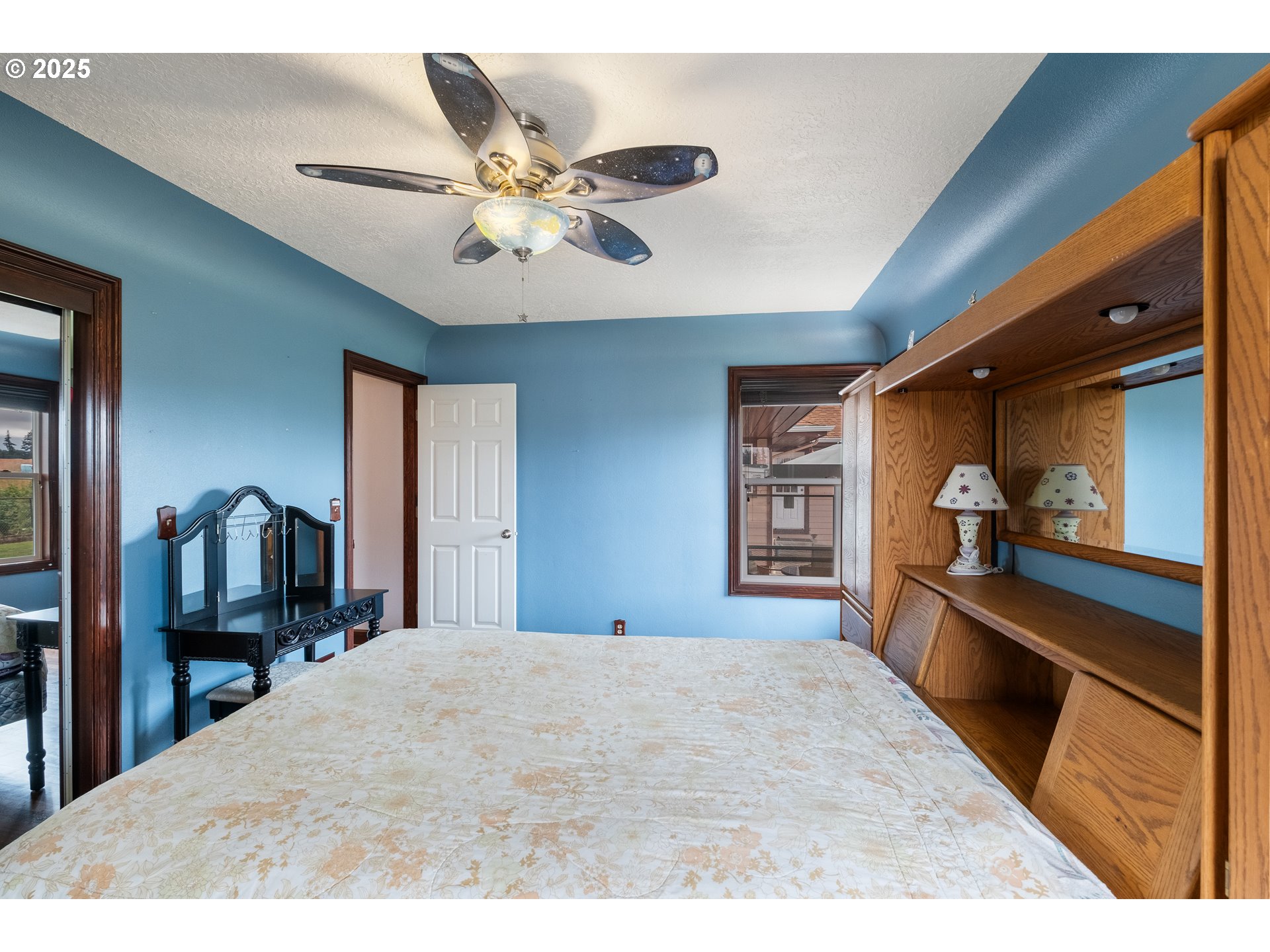 8758 Stayton Road Southeast Turner, OR 97392 - Photo 25 of 39 a bedroom with a bed and a large mirror