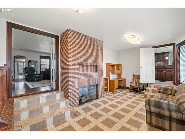 a bedroom with a bed and dresser