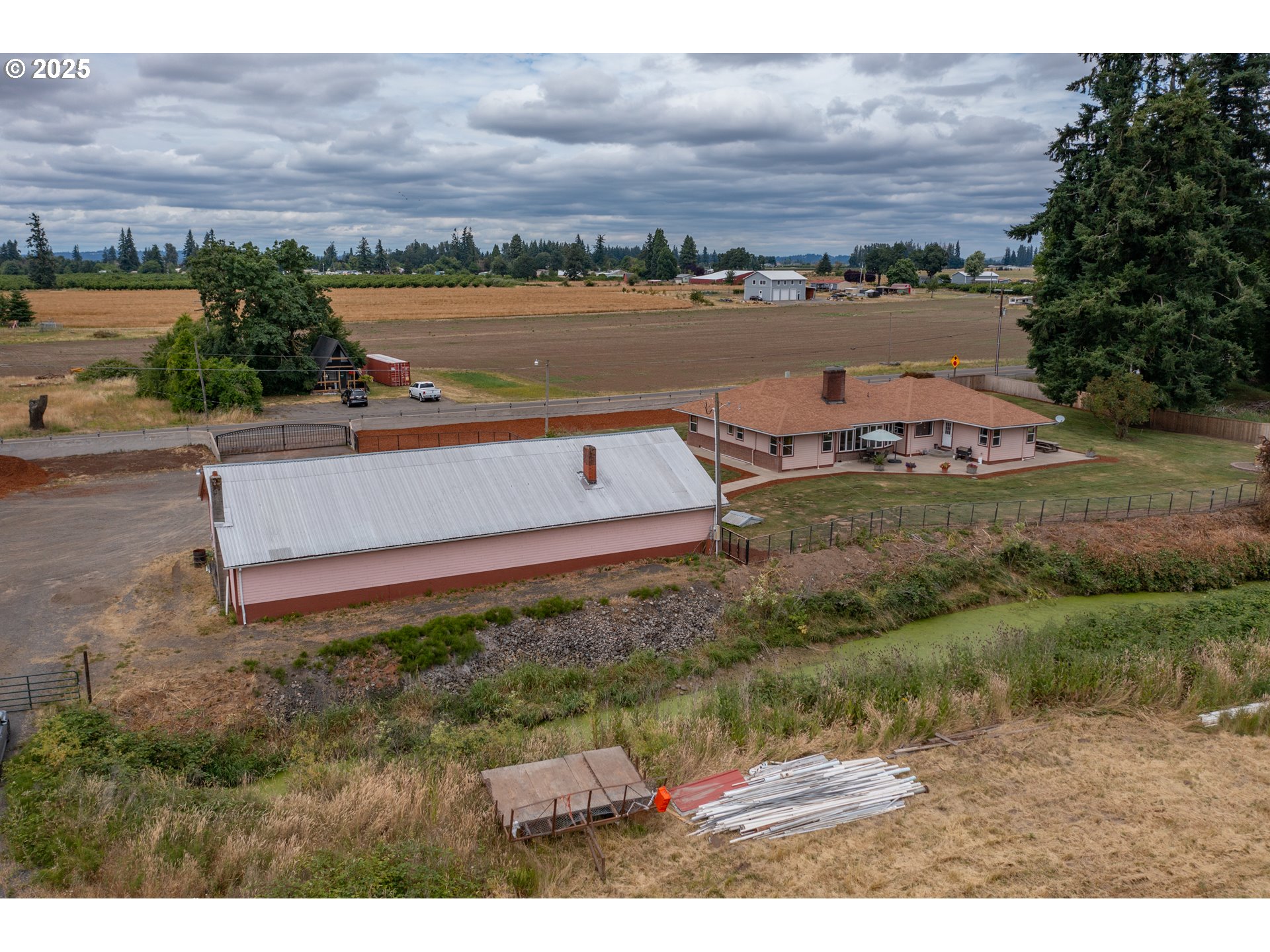 8758 Stayton Road Southeast Turner, OR 97392 - Photo 36 of 39 an aerial view of a house with a lake view