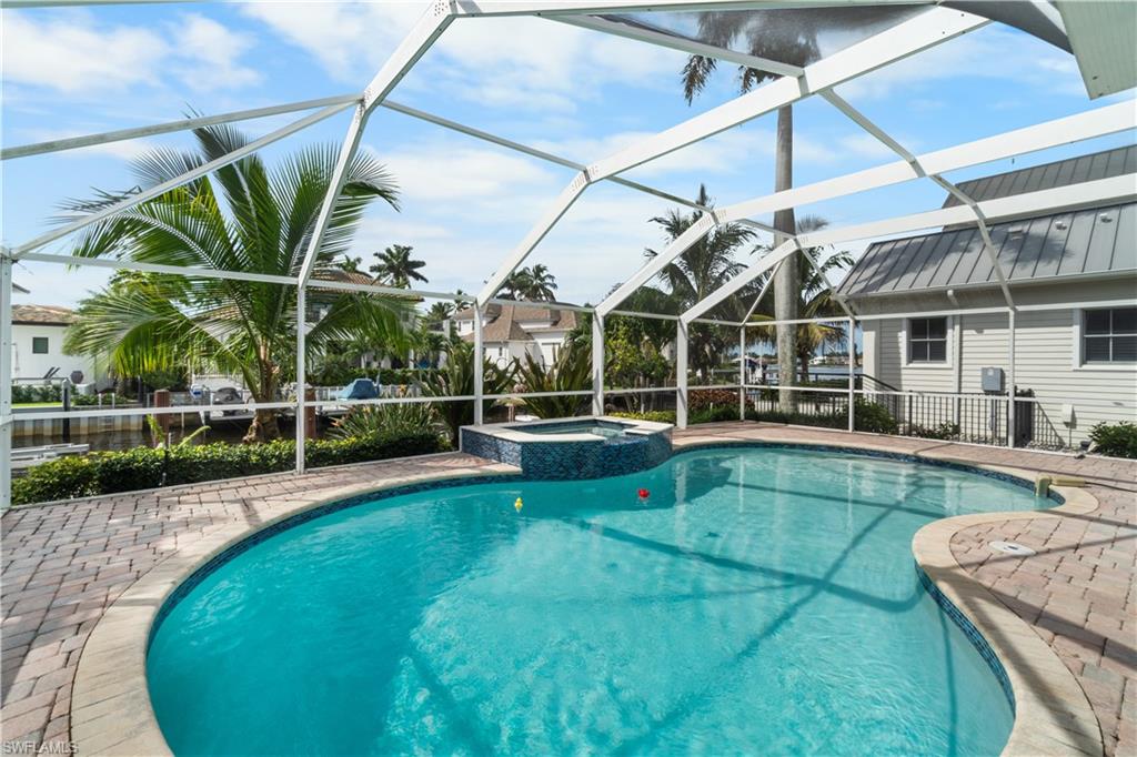 1320 Marlin Drive Naples, FL 34102 - Photo 25 of 33 a view of a house with a swimming pool