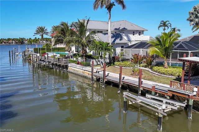 a view of swimming pool with outdoor seating