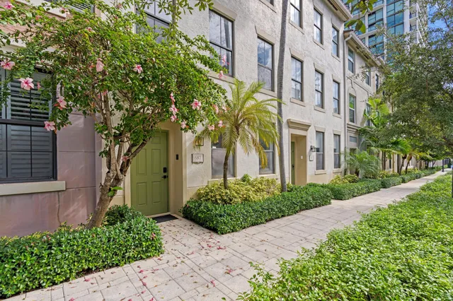 a view of a building with a yard