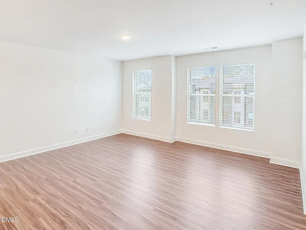 a bedroom with bed and a couch