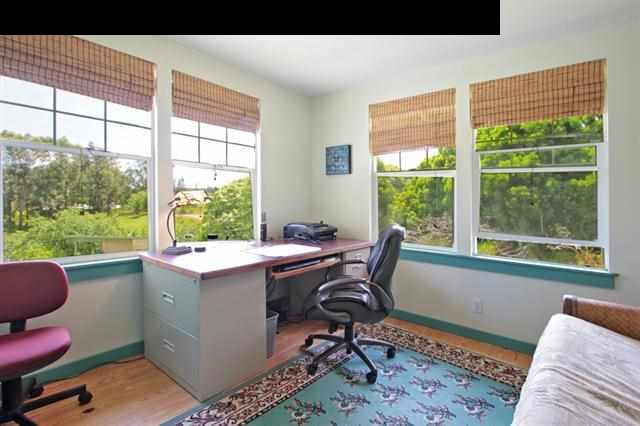 260 Awalau Road Haiku, HI 96708 - Photo 13 of 30 a view of a workspace with furniture and a window