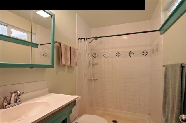 260 Awalau Road Haiku, HI 96708 - Photo 27 of 30 a bathroom with a sink toilet and shower