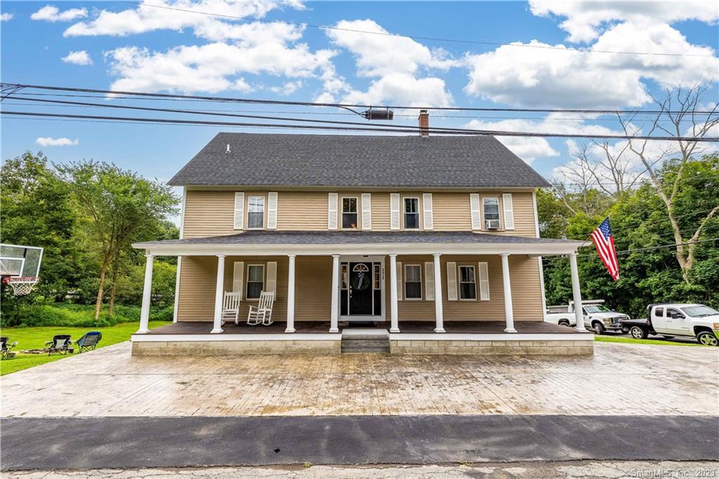171 Halls Hill Road Killingly, CT 06239 - Photo 1 of 1 a front view of a house with a yard